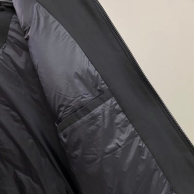 Prada-branded puffer gilet — 10