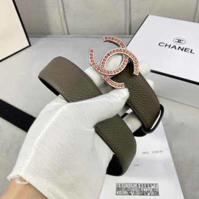 Chanel belt featuring a gold-toned CC logo buckle embellished with orange stones — 6