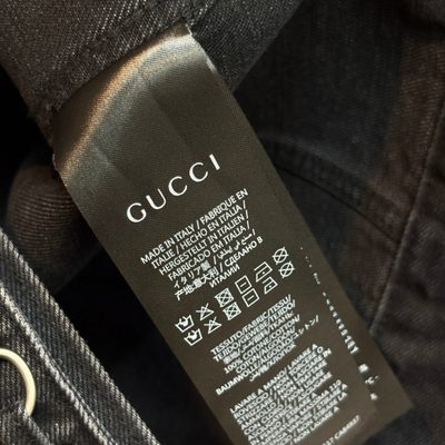 Gucci dark gray stone-washed cotton denim jacket and matching wide-leg jeans — 11