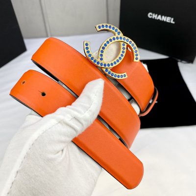 Chanel orange grained calfskin belt featuring a silver-tone interlocking CC buckle with navy blue de — 9