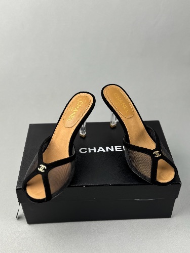 Chanel black mesh peep-toe mules featuring transparent heels and gold CC logo accents — 4