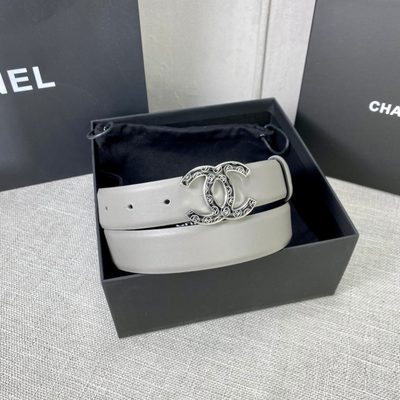 Chanel grey leather belt featuring a distinctive patterned silver-tone CC logo buckle — 5