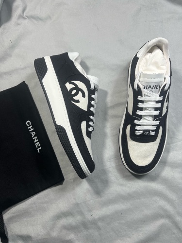 Chanel trainers in white and black