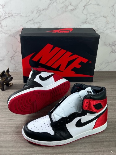 Nike Air Jordan 1 Retro High Satin Black Toe (W) sneakers.