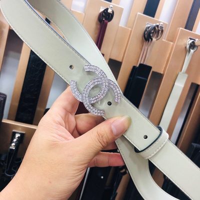 Chanel belt features a distinctive double-C buckle — 5