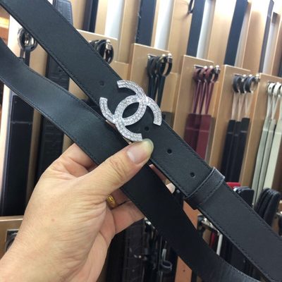 Chanel belt features a distinctive double-C buckle — 8