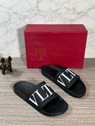 Valentino Garavani black PVC slide sandals