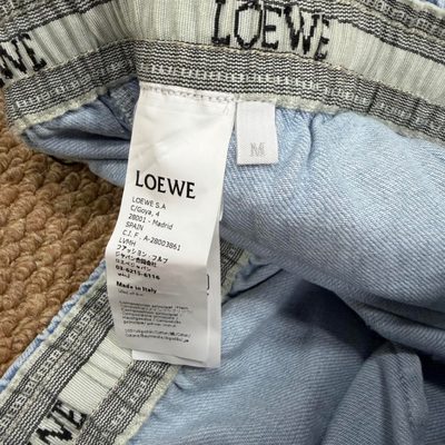 Loewe Paula's Ibiza Wide-Leg Drawstring Jeans in washed blue denim — 7