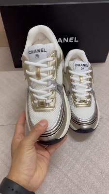 Chanel CC Runner sneakers in white, gold, and silver — 5