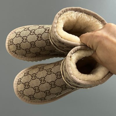 Gucci GG Monogram mini boots