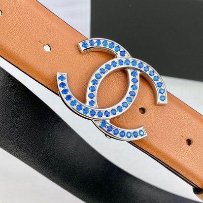 Chanel belt features a camel-colored leather strap and a gold CC logo buckle — 8