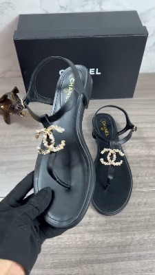 Chanel black leather thong sandals — 5