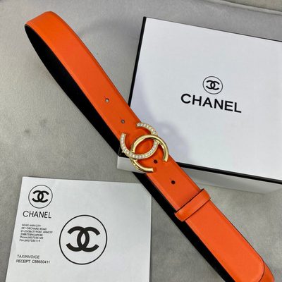 Chanel women's belt features a vibrant orange leather strap paired with a silver-tone, rhinestone-em — 5