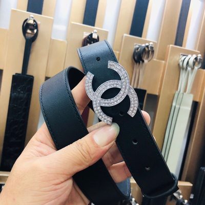 Chanel belt features a distinctive double-C buckle — 7