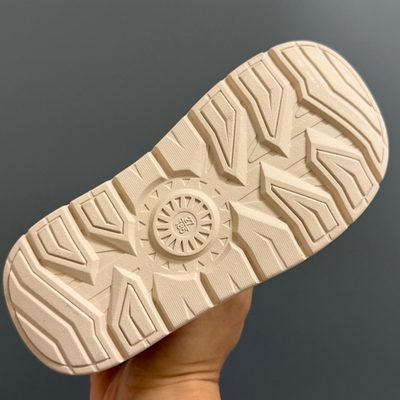 UGG-branded platform or utility-style ankle boots — 8