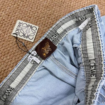 Loewe Paula's Ibiza Wide-Leg Drawstring Jeans in washed blue denim — 6