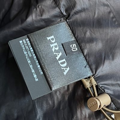 Prada shiny nylon puffer jacket — 11