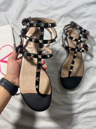 Valentino Garavani Rockstud black leather flat caged thong sandals — 3