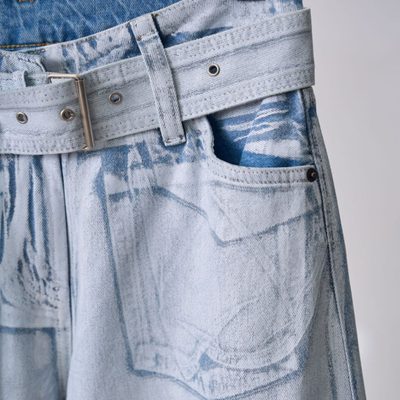 Acne Studios belted denim trousers featuring a light-washed — 7