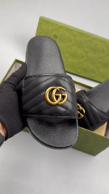 Gucci Black Leather GG Marmont Slides featuring a gold-toned Double G logo — 5