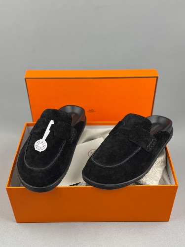 Hermès Go mules in black suede