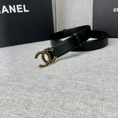 Chanel leather belt features a distinctive silvertone buckle — 7