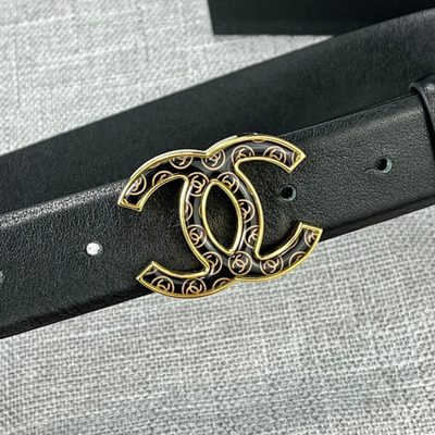 Chanel leather belt features a distinctive silvertone buckle — 9
