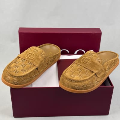Gucci Celia GG Suede Mules in a light brown color
