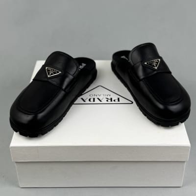 Prada loafers with a classic triangle logo — 4