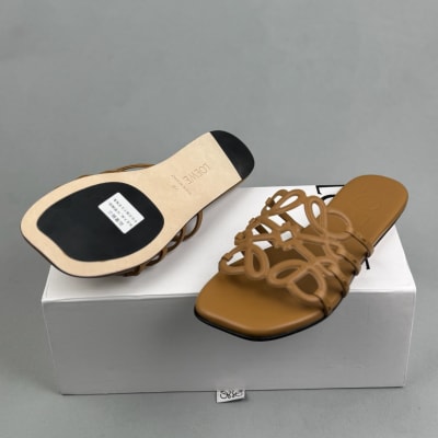 Loewe Petal Anagram slides in tan calfskin