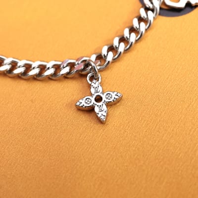 Louis Vuitton chain charm bracelet — 7
