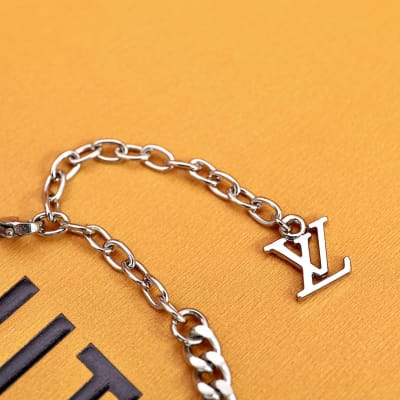 Louis Vuitton chain charm bracelet — 5