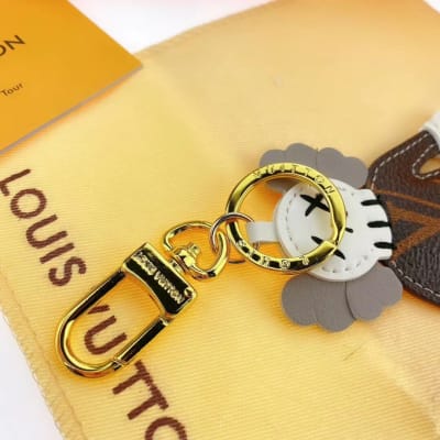 Louis Vuitton x KAWS leather character bag charms — 6