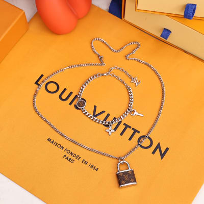 Louis Vuitton chain charm bracelet — 9