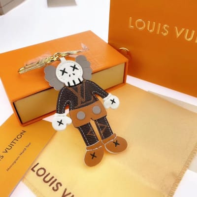 Louis Vuitton x KAWS leather character bag charms — 5