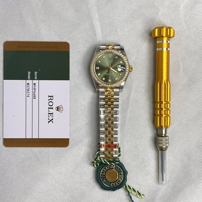 Rolex Watch — 9