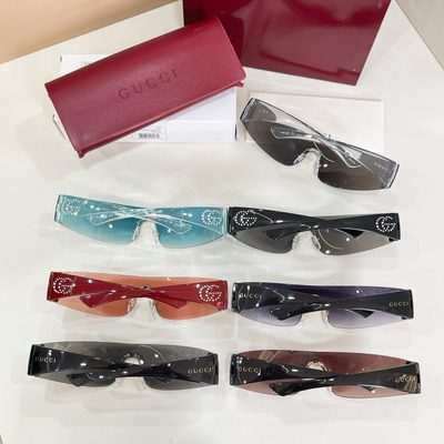 Gucci Sunglasses — 9