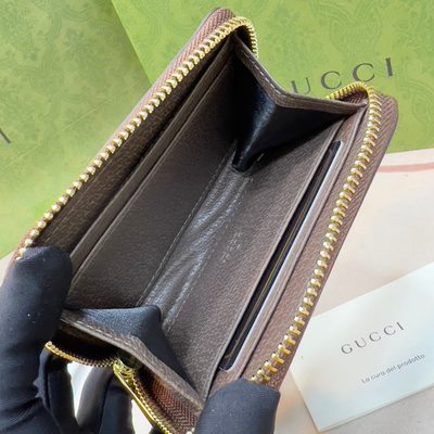 Gucci zip wallet — 7