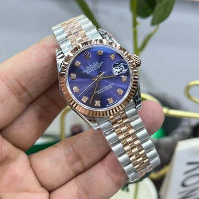 Rolex Watch — 9