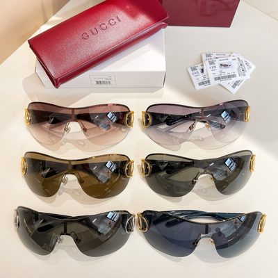 Gucci Sunglasses — 9