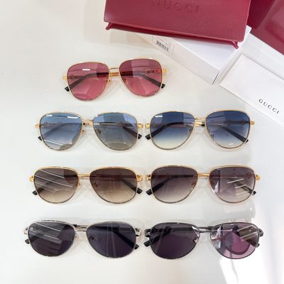Gucci Sunglasses — 9