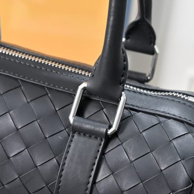 Bottega Veneta-style black woven Intrecciato leather pillow bag — 7