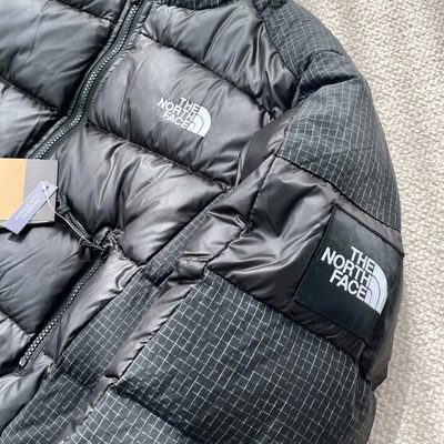 The North Face black cropped puffer jacket — 4