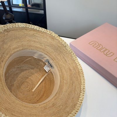 Miu Miu Bucket Hats — 9