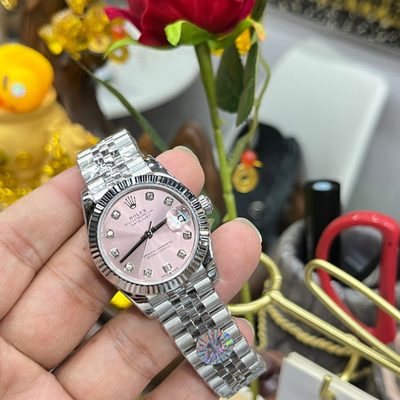 Rolex Watch — 9