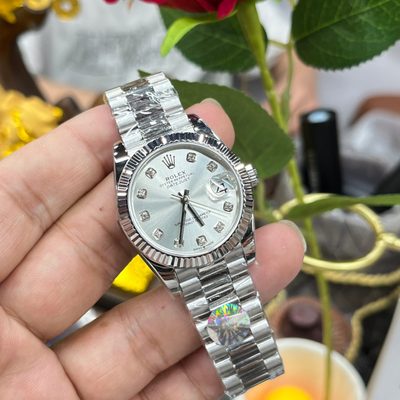 Rolex Watch — 9