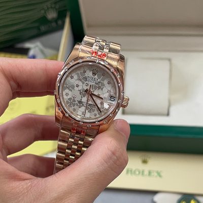 Rolex Watch — 7