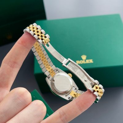 Rolex Watch — 9