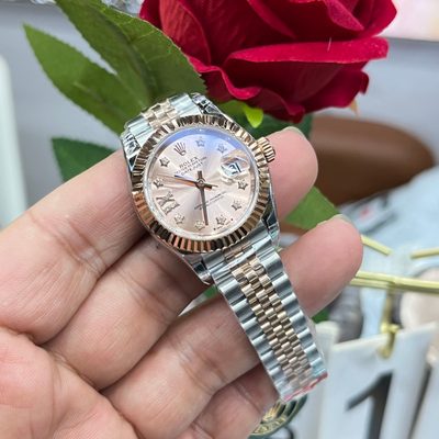 Rolex Watch — 9