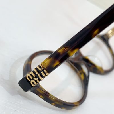 Miu Miu Sunglasses — 9